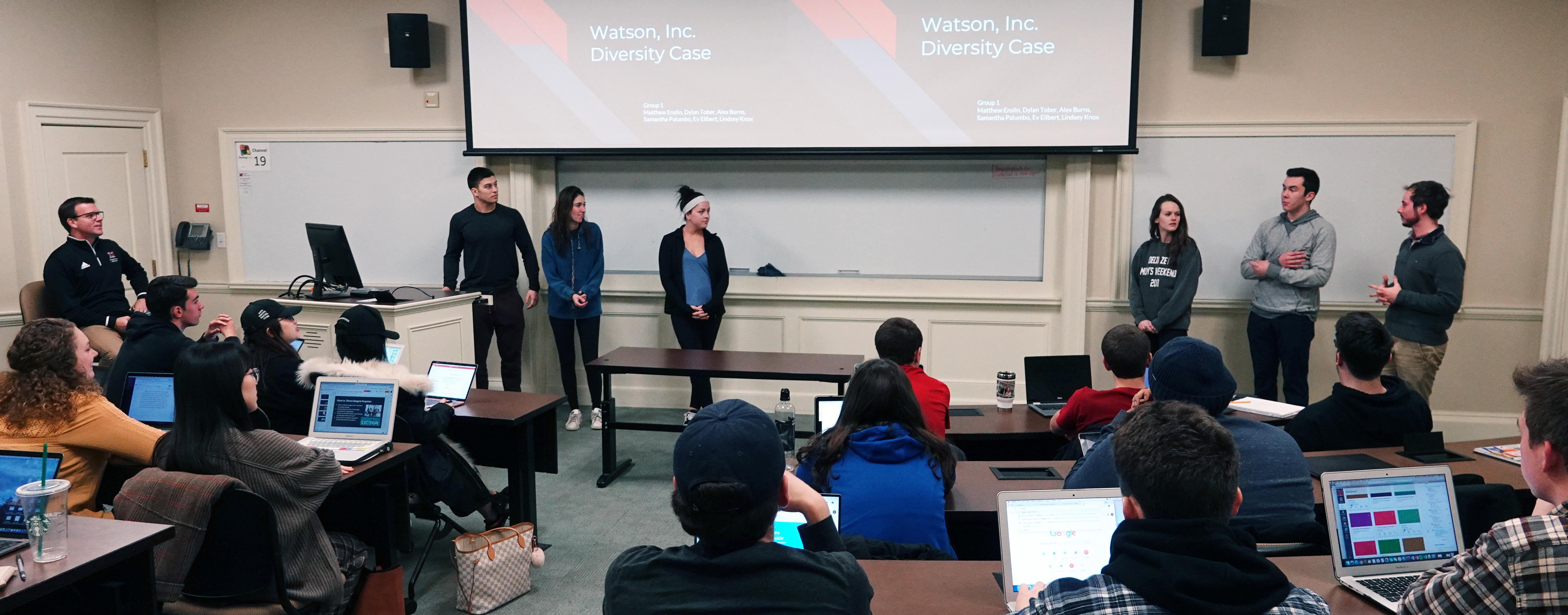 Students make presentation in management class