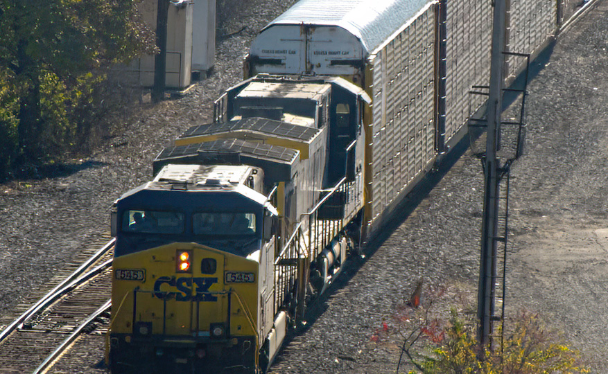 Freight train pulling into yard