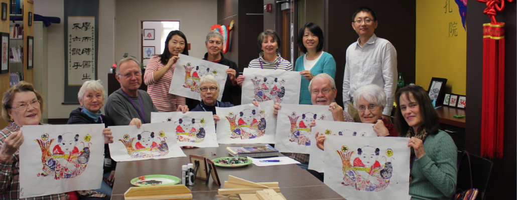 Participants showing Chinese paintings