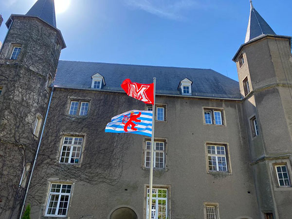 Miami in Luxembourg Chateau with flags waving