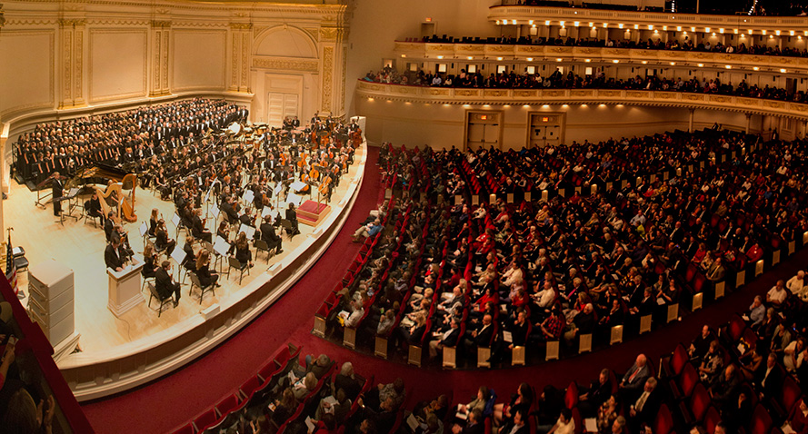 Our Orchestra and Choir Ensembles Performing in Carnegie Hall in front of a large audience