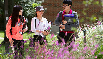 Three international students participating in Global Summer experience.
