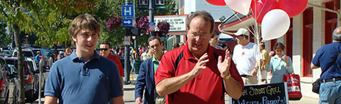 A father and son strolling uptown