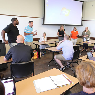 Teachers participating in post-graduate education in VOALC classroom