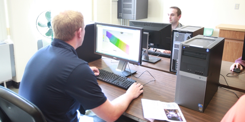 Student working on a computer in the Finite Element Analysis Lab