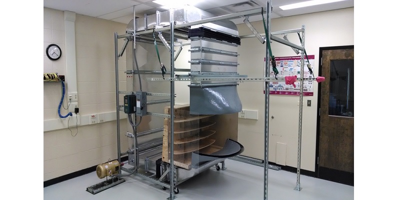 Simulator of open refrigerated display case with curved air curtains