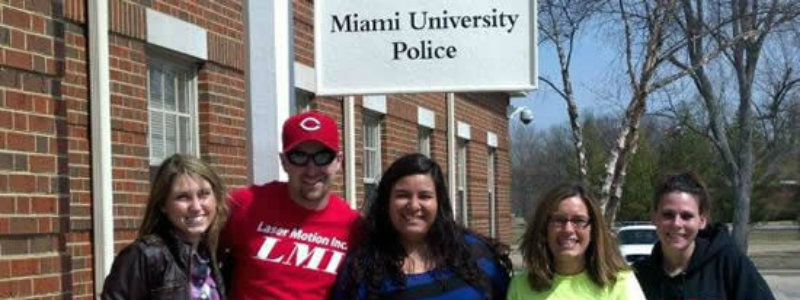 CJ Society Members standing in from of Oxfords police department.