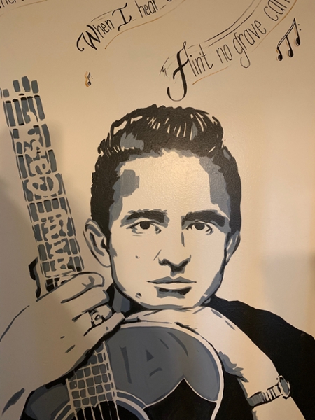 A painted photo of Johnny Cash.