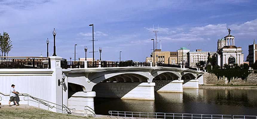 Photo of Downtown Hamilton with a bridge and water in the background.