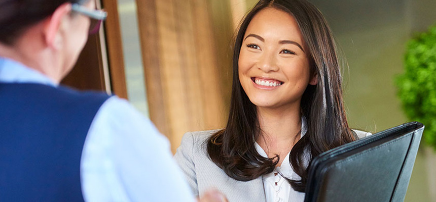 Female talking to a male during an interview