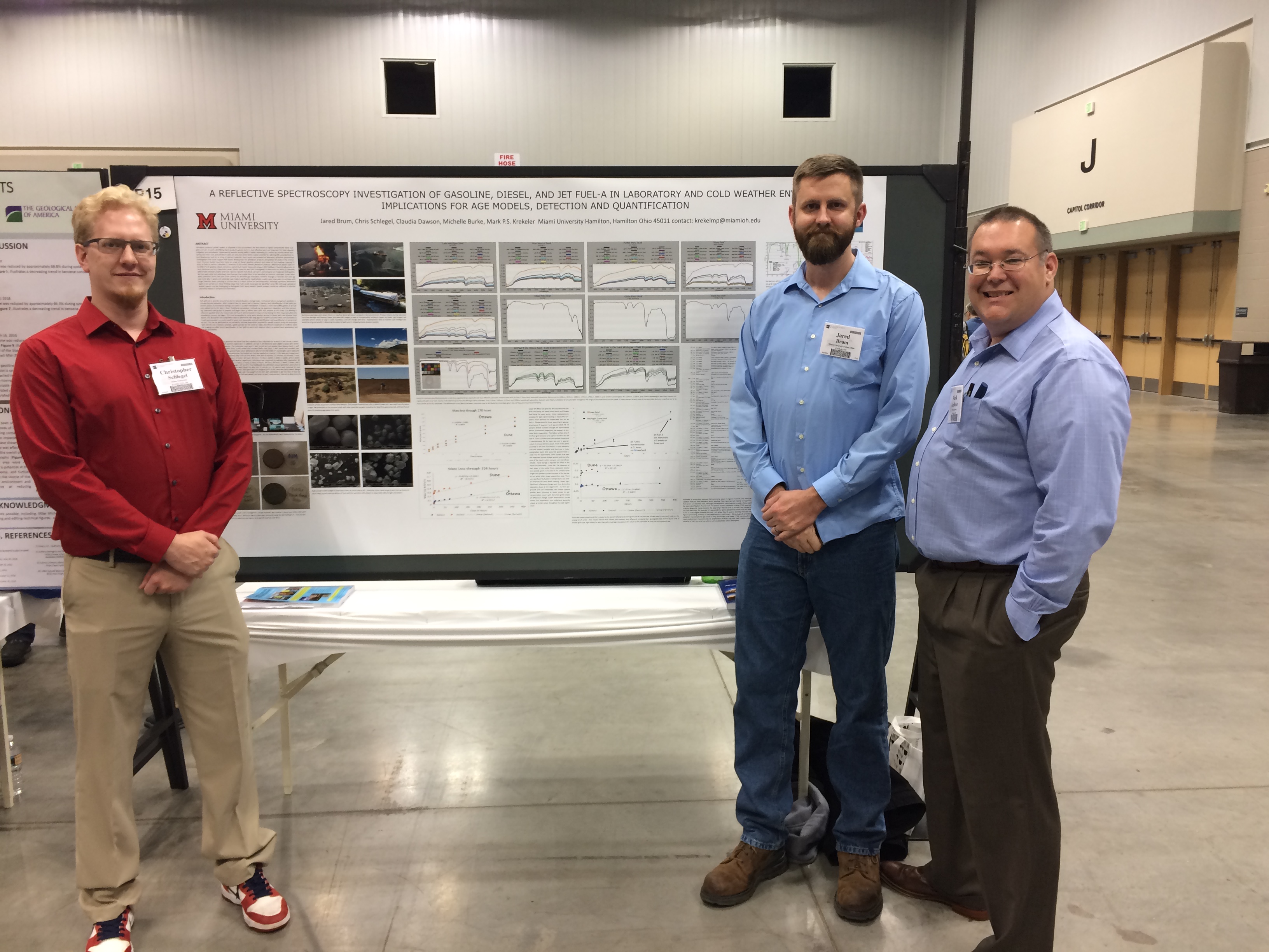 Chris Schlegel (left) and Jared Brum (right) presented a poster focused on remote sensing of environmental spills of jet fuel and diesel fuel.