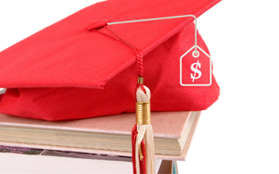 Graduation cap sitting on books. 