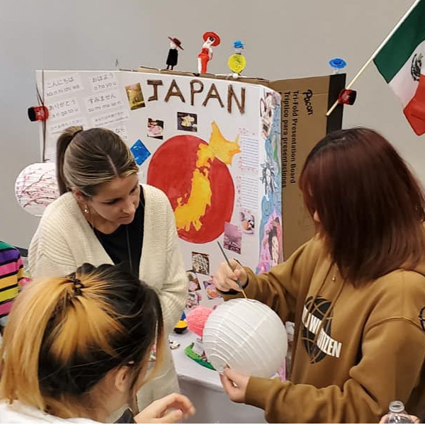 Painting lanterns with local families during International Education week.