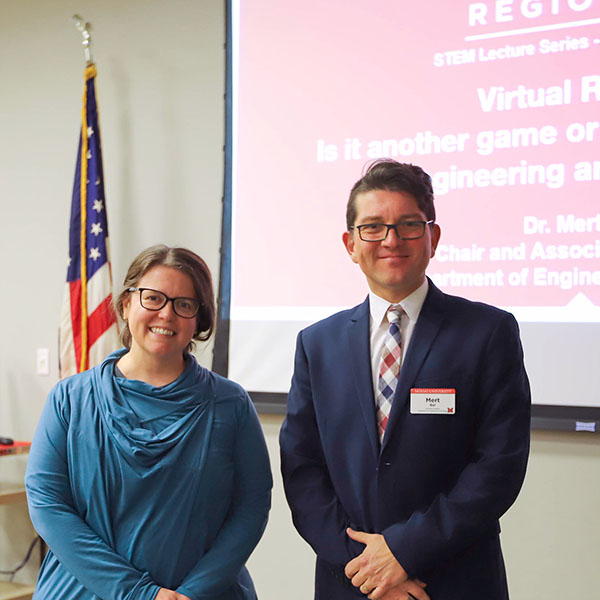 Miami Regionals faculty presenting at an event