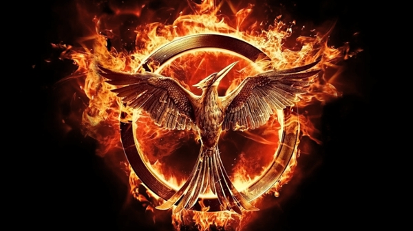 Hunger Games Mockingjay Logo - phoenix surrounded by flames.