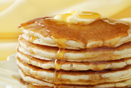 stack of pancakes with butter melting on top