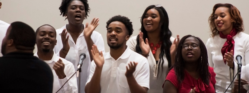 Miami students singing in a gospel choir