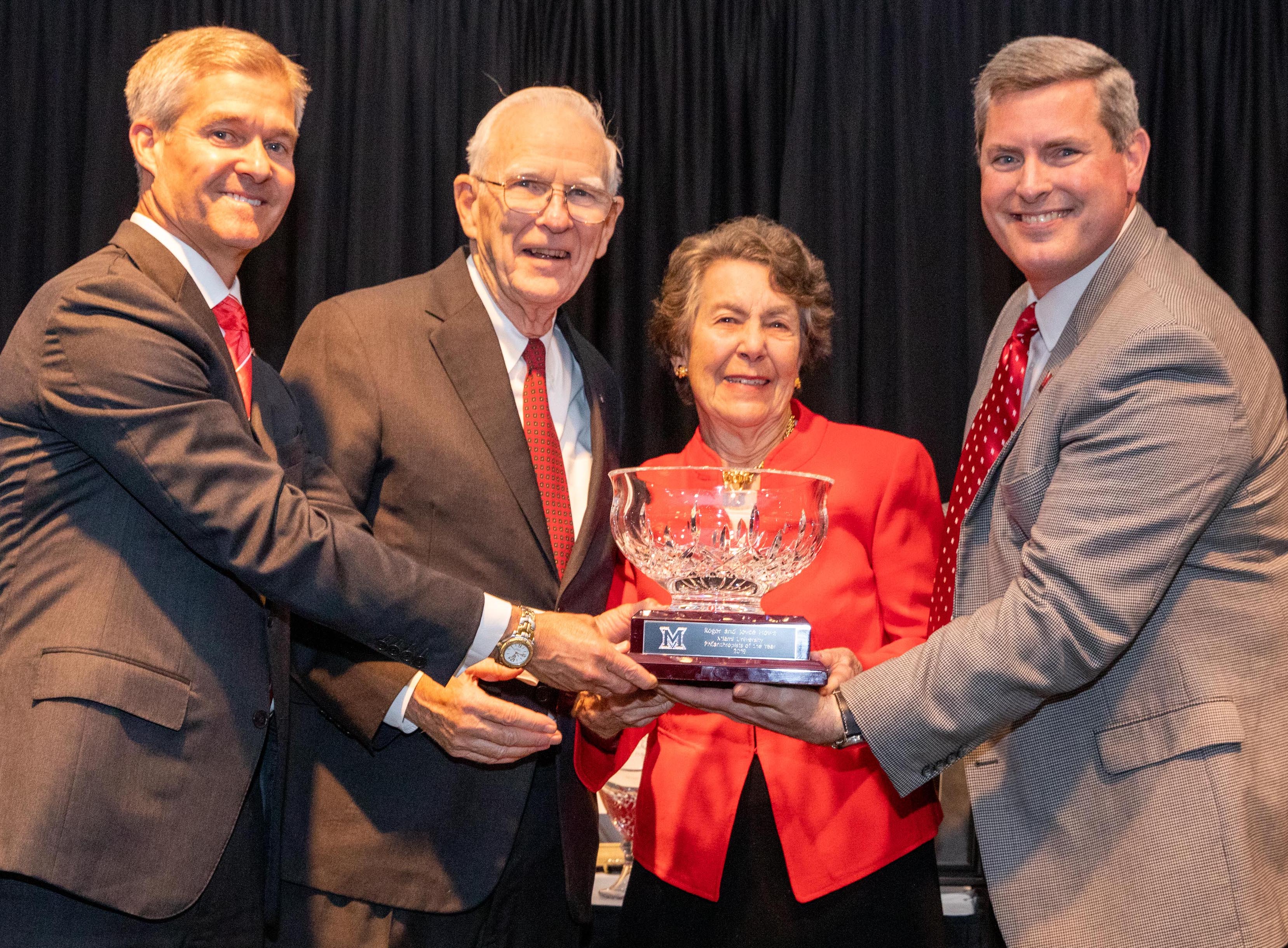 Roger and Joyce Howe receiving award.