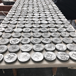 A table full of small gray disks