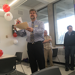 Steve Thole regaling onlookers with stories about Mary Beth.