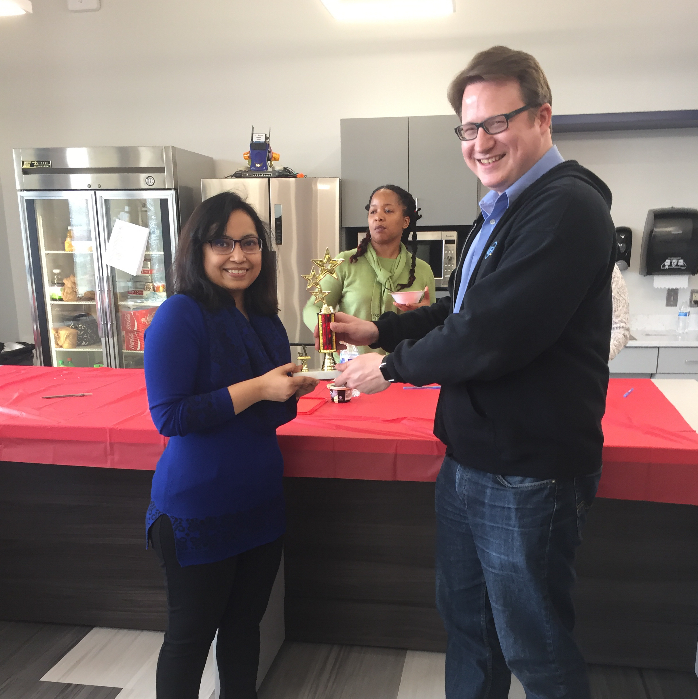ishmat zerin and mike beck shaking hands after the competition