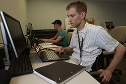 A student with disabilities working on a computer