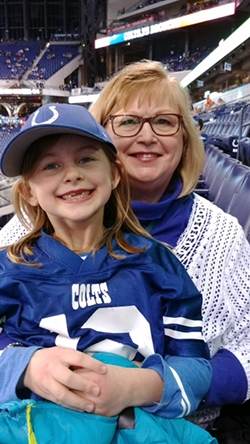 Donna Amrhein and her grandchild