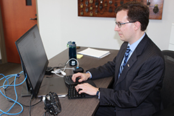 David Seidl sitting at his desk