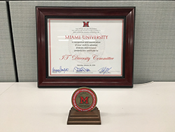 Plaque and medal given to IT Diversity Committee for excellence in promoting diversity and inclusion
