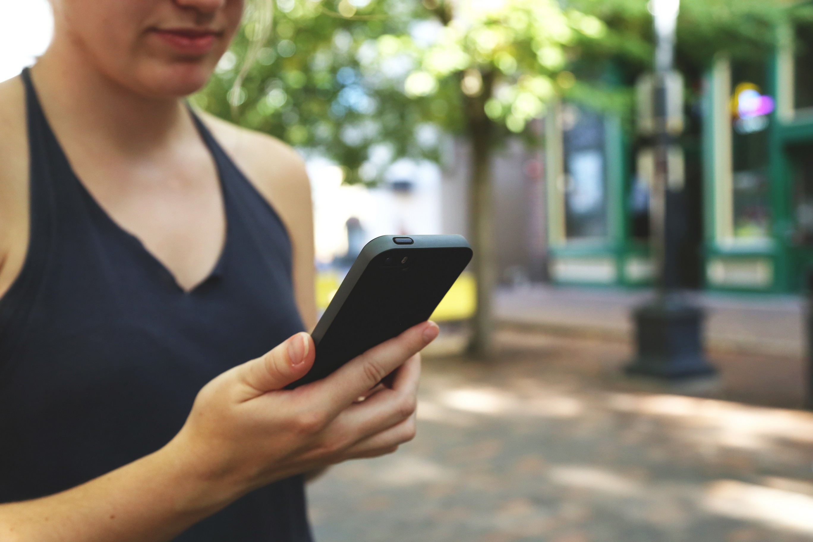 A women holding a mobile phone