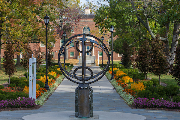 The Miami compass in front of a springtime scene