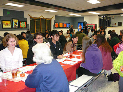 International students enjoy a Thanksgiving dinner.