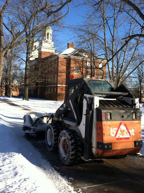 Photo of Bobcat clearing snow from campus