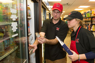 Students working at Shriver store.