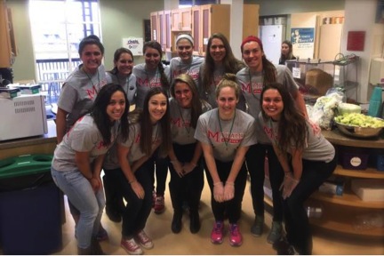 Miami's swimming team at Ronald McDonald House