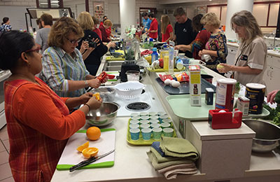 Staff members learn some new cooking skills
