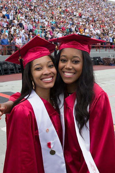 Two female graduates at commencement