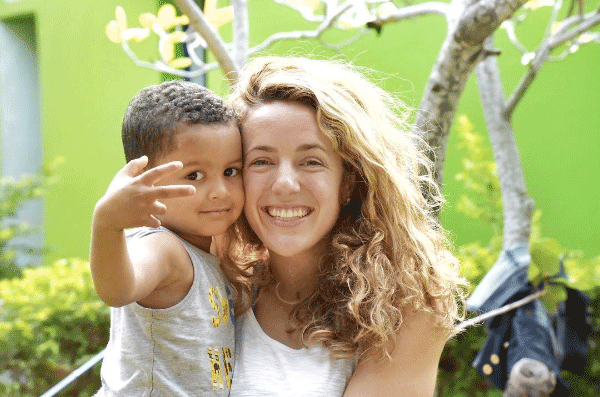 Frankie Roskam with a boy in the Dominican Republic