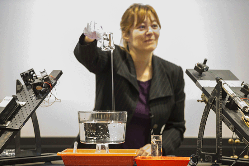 Burin Baryam pulls out a glass cup hidden in a glycerin-filled jar.