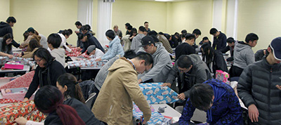 Students wrap presents at the Regionals.