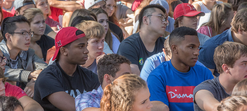Students of the Class of 2021 were selected from a record number of 30,255 applicants. A group of students listen to a previous year's convocation speaker. Convocation 2017 is Friday, Aug. 25.