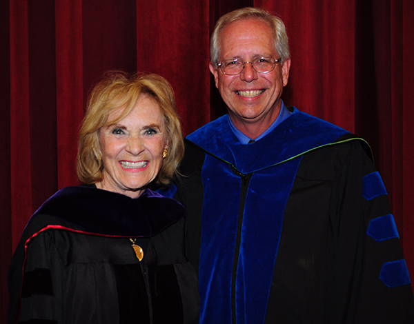 Patricia Breen Lang and Jim Oris, director of the Graduate School celebrate her honorary doctorate degree.
