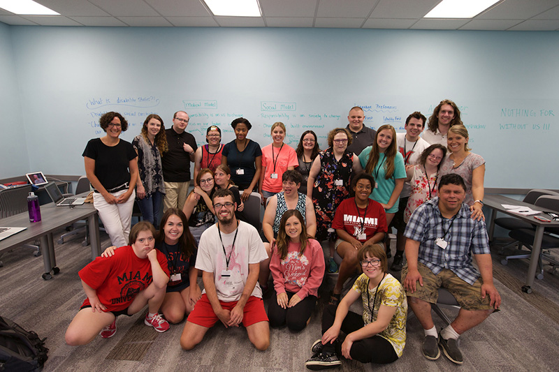 Students smile for the camera.