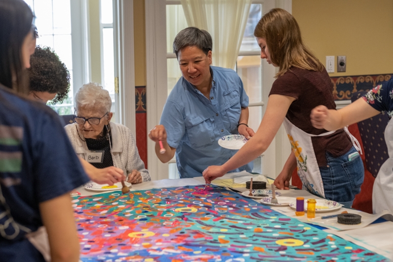 A Miami University student works with an 'artist' during a recent OMA session.