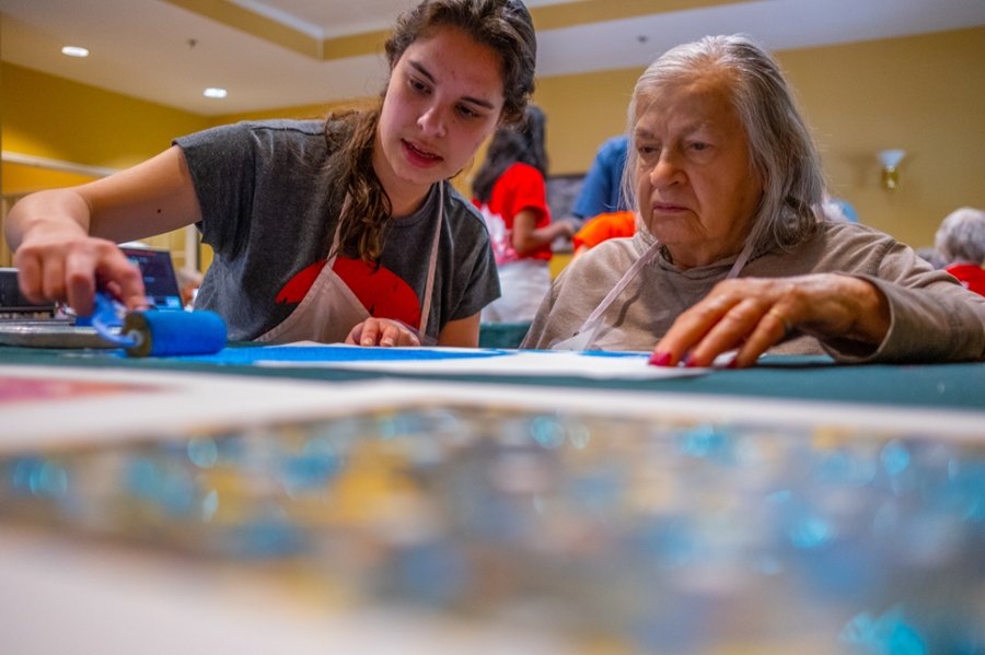 A Miami University student works with an 'artist' during a recent OMA session.