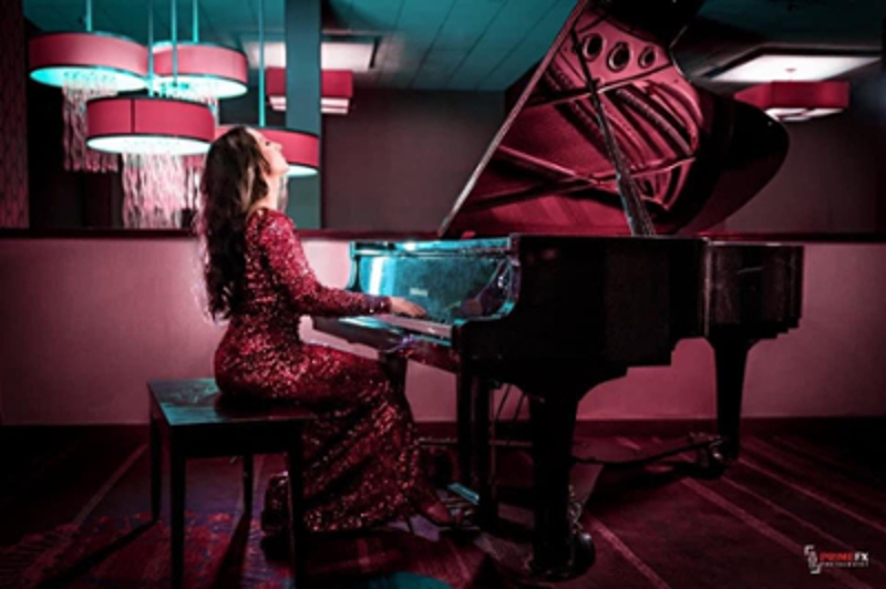 Aimee James discovered the piano at age 4 and wrote her first song at 9. Here she's playing the piano at the Crowne Plaza Dayton, a job she was offered on the spot after playing Lady Gaga's Bad Romance.
