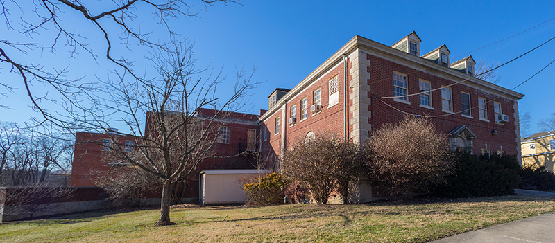 The storage building where the new College at Elm will be in the future