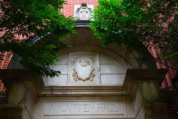mcguffey hall entry closeup detail with leafy branches in front