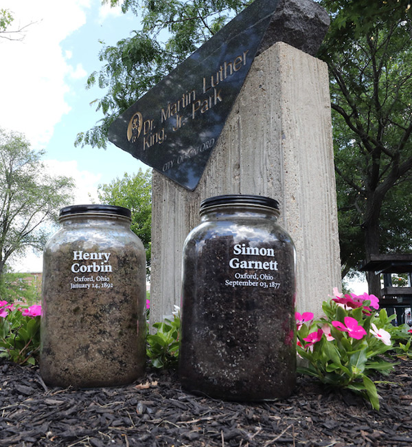 Soil collected in 2019 from the lynching sites join jars from across the nation at the Equal Justice Initiative's Legacy Museum in Alabama. Note: Research discovered two differeent , spellings for one victim's name. It was later determined that the correct spelling is Simeon Garnet.