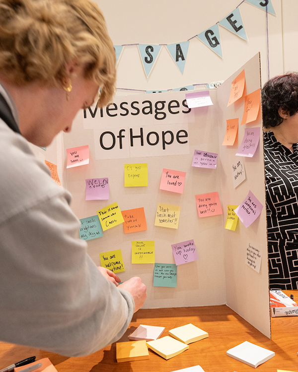 a board where people are adding messages of hope